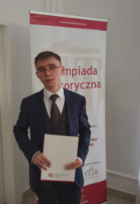 Janek po otrzymaniu nagrody w  Olimpiadzie Historycznej
