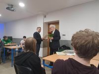 Podziękowania i kwiaty dla p. Arkadiusza Małyszki za wykład